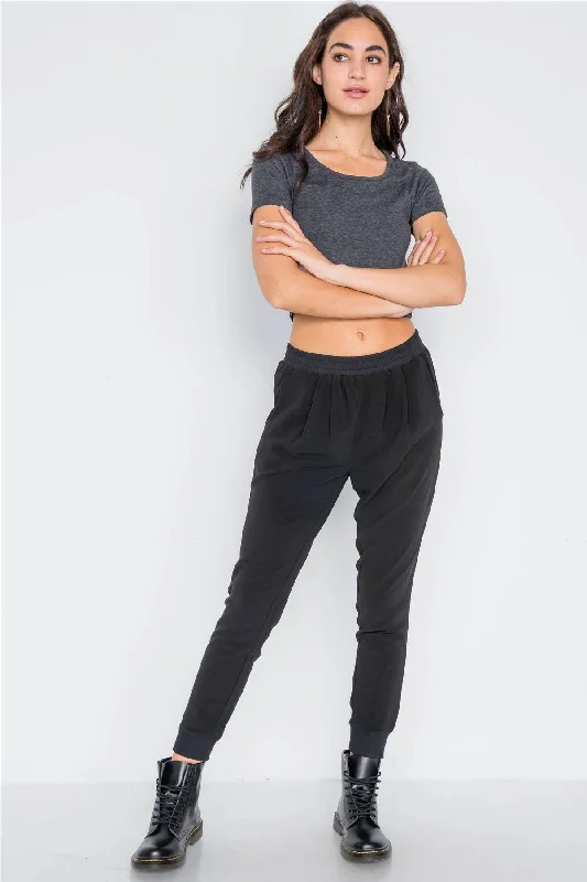 Stirrup PantsBlack Mid-Rise Solid Skinny Leg Pants